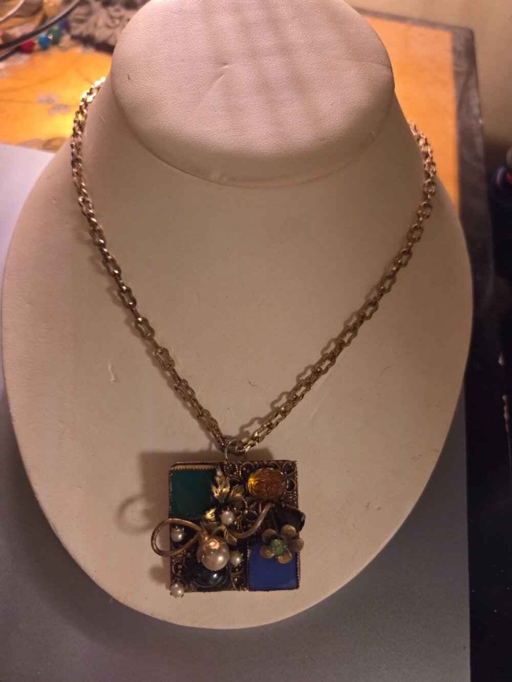 Vintage brooch on chain